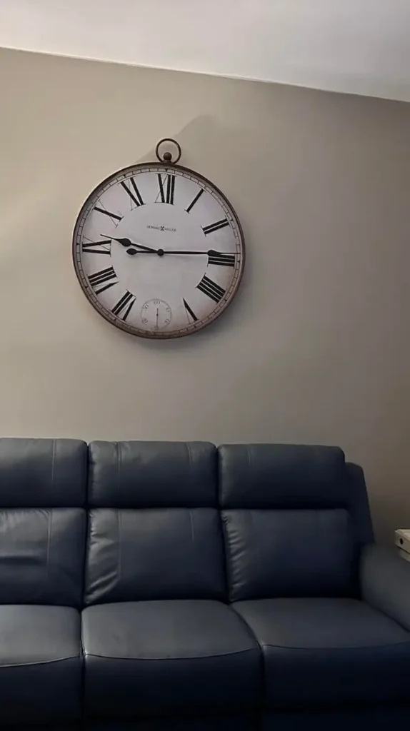 behind couch Statement Clock behind couch Statement Clock